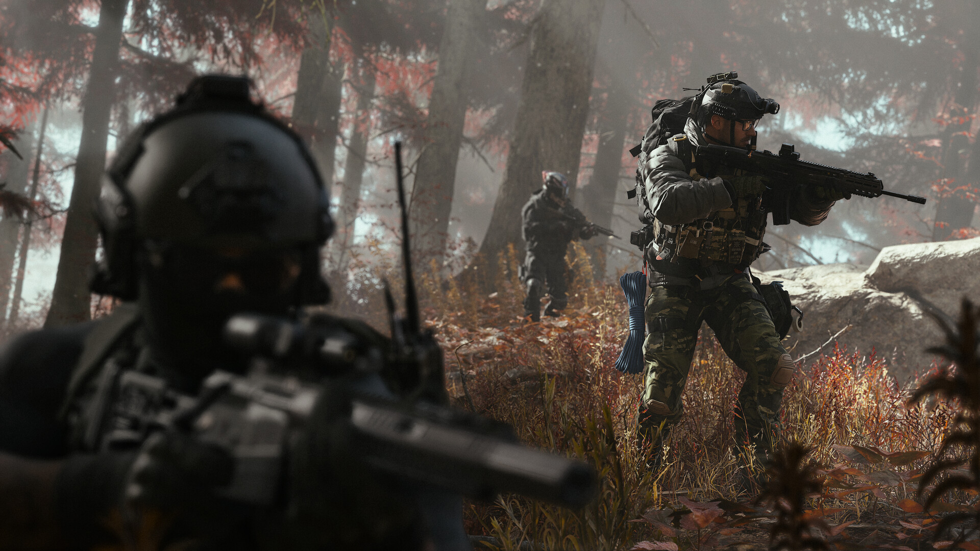 Soldiers infiltrating through foggy autumn woodland